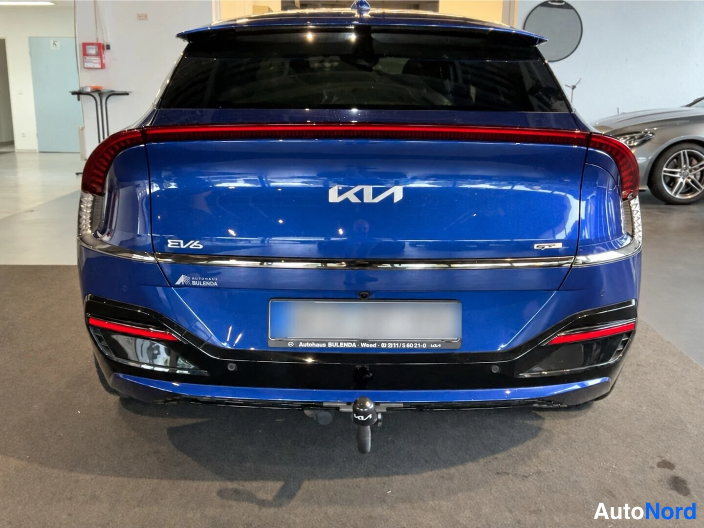 Sininen Kia EV6 GT 2023, takaa, kuva 6