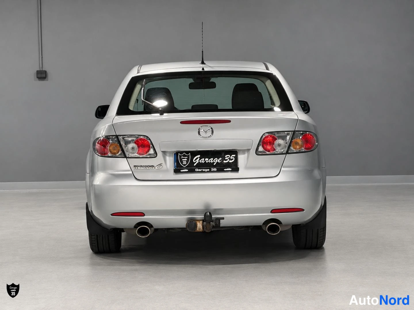 Grå Mazda 6 2006, bakifrån, bild 8