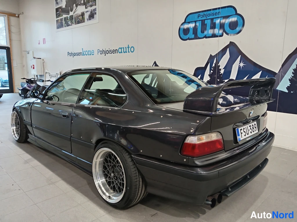 BMW 323i 1996, takaviisto, kuva 7