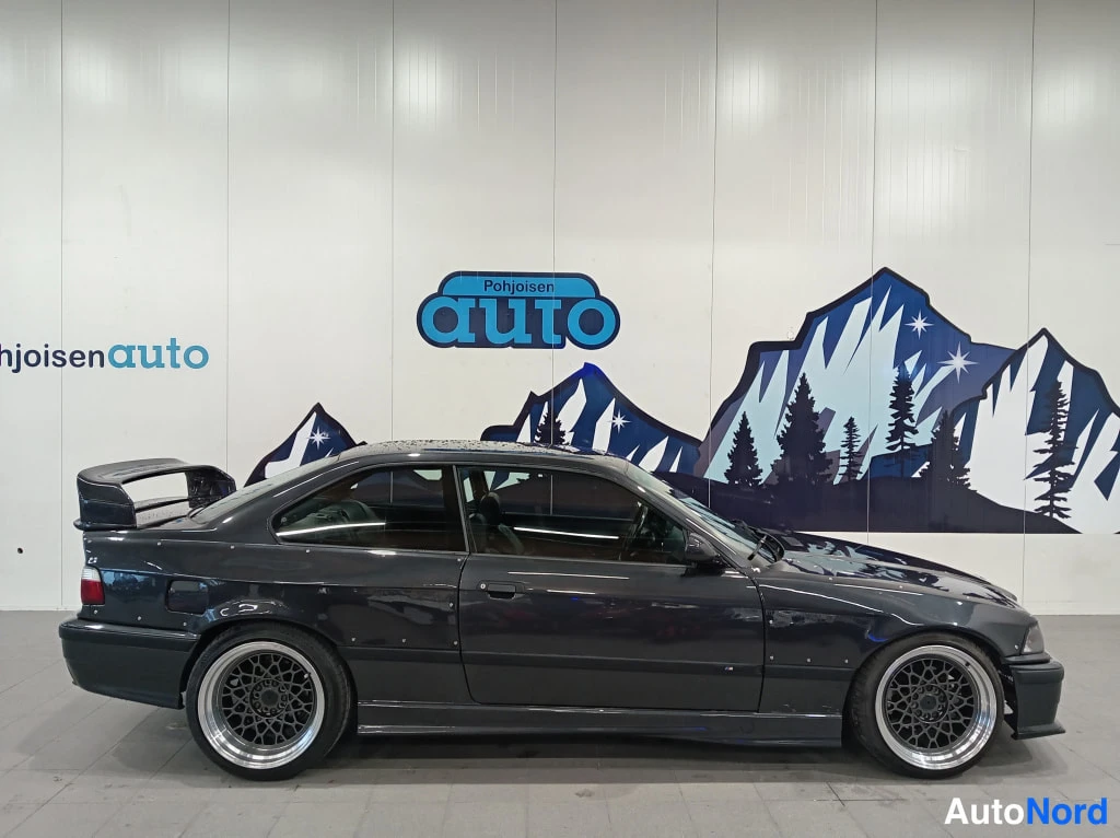 BMW 323i 1996, etuviisto, keula oikealle, kuva 3
