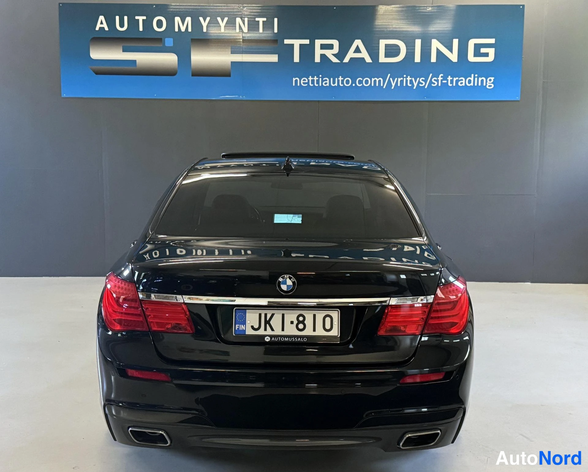 Musta BMW 740d xDrive 2011, takaa, kuva 8