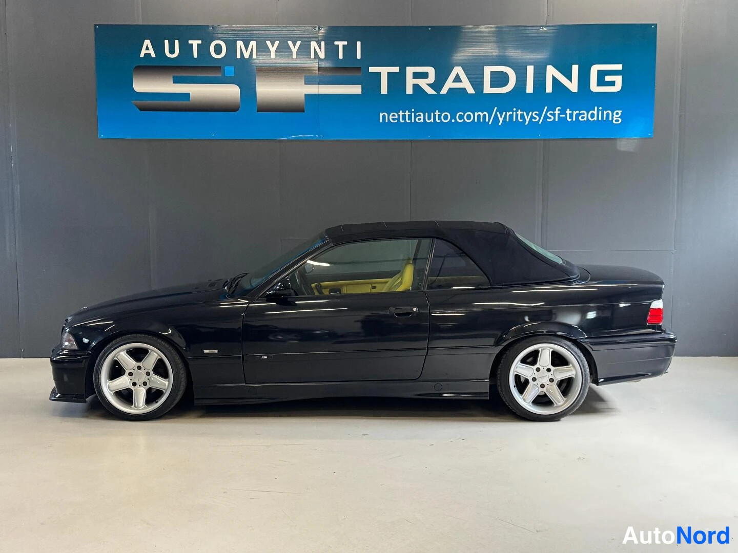 Musta BMW 328i 1998, etuviisto, keula vasemmalle, kuva 4