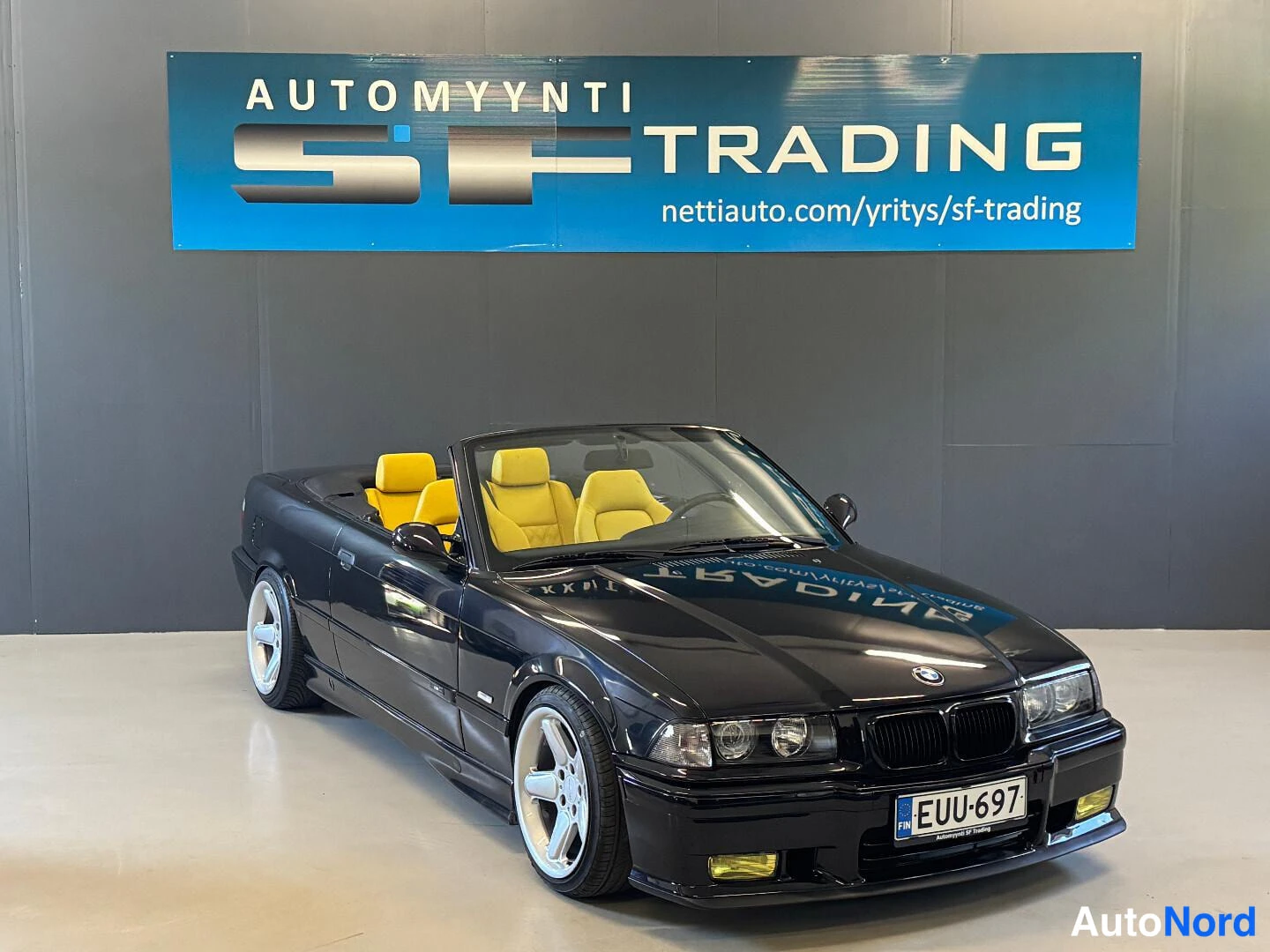 Musta BMW 328i 1998, etuviisto, keula oikealle, kuva 2