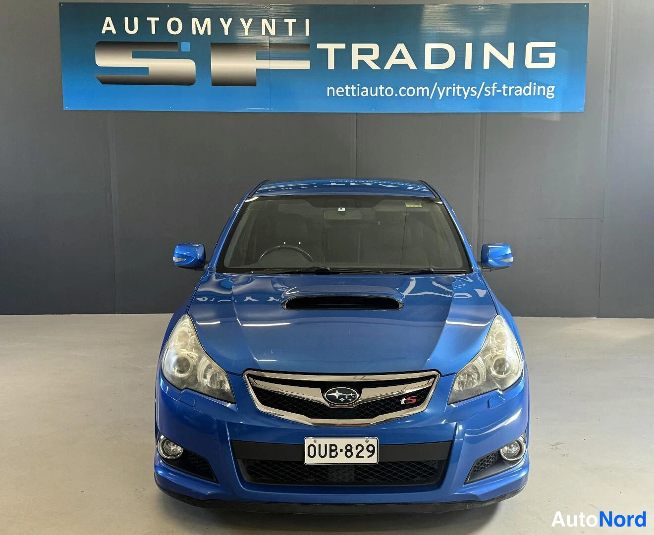 Sininen Subaru Legacy 2010, edestä, kuva 3