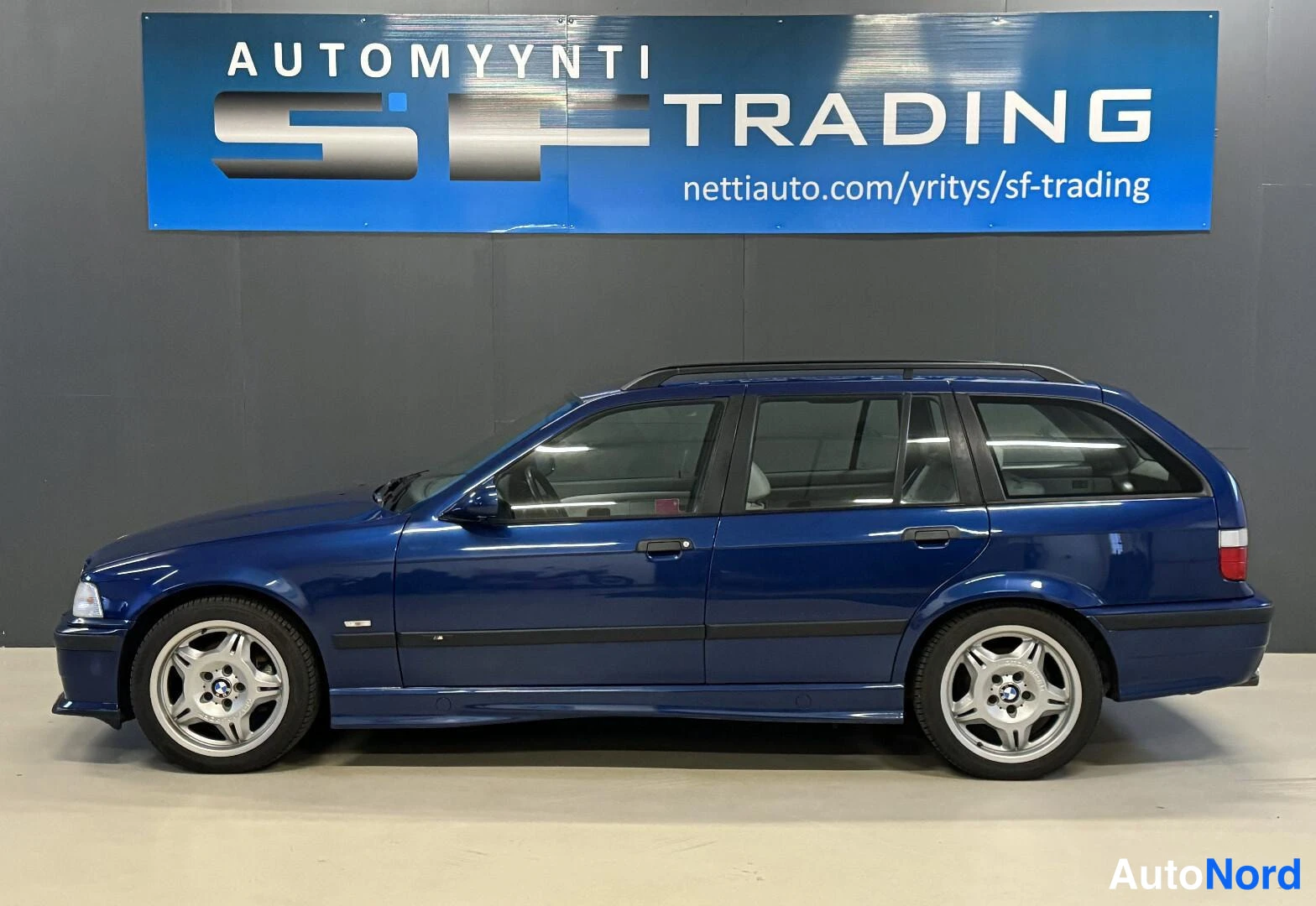 Sininen BMW 323i 1998, kuva 5