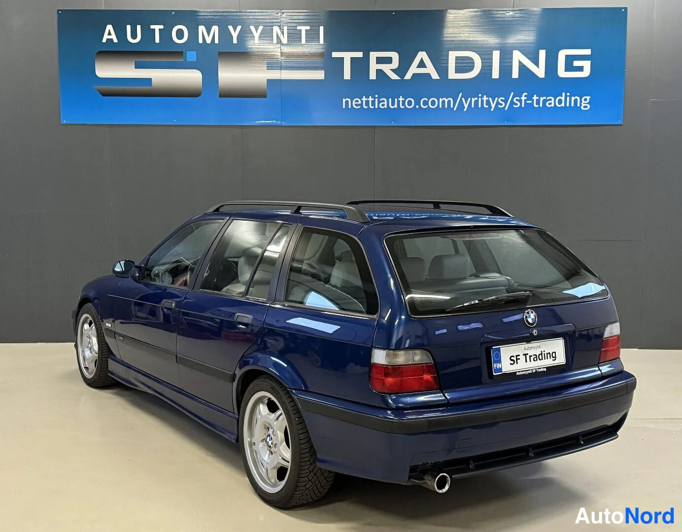 Sininen BMW 323i 1998, kuva 7