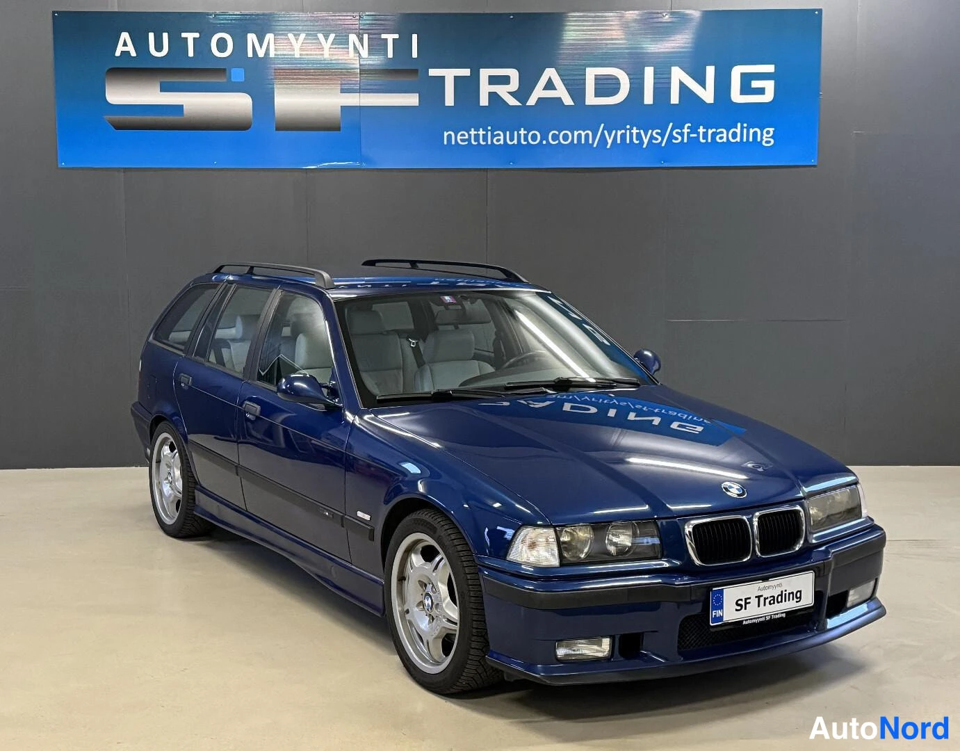 Sininen BMW 323i 1998, kuva 3