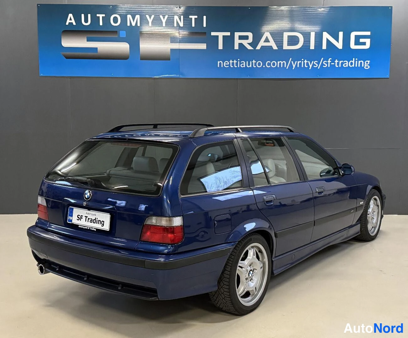 Sininen BMW 323i 1998, kuva 8