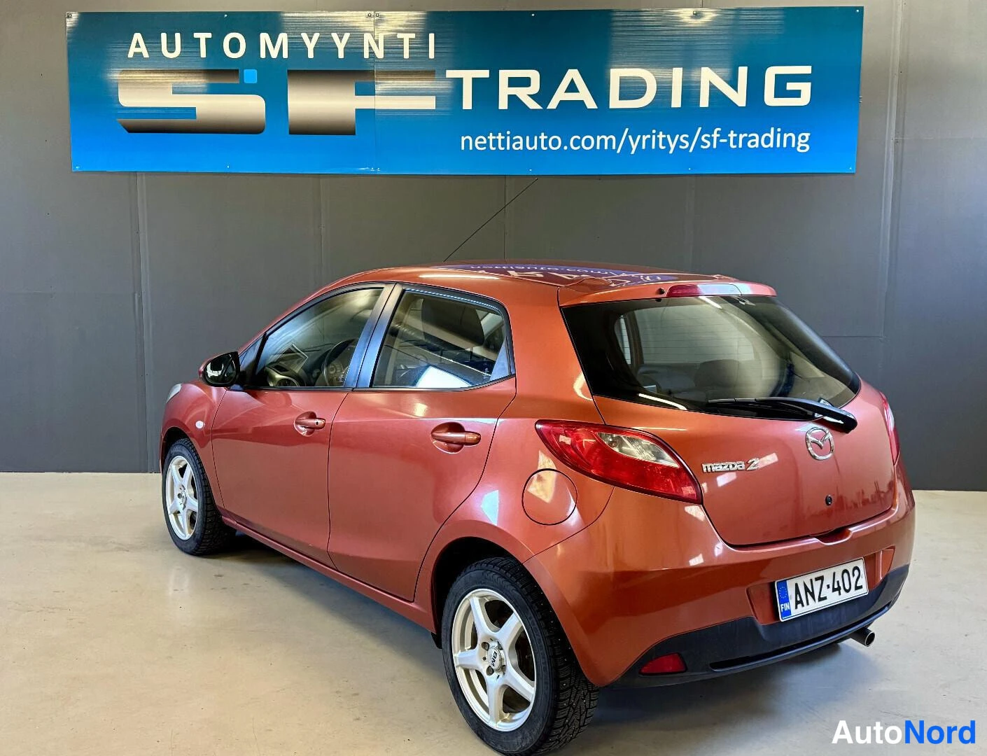 Punainen Mazda 2 2009, kuva 5