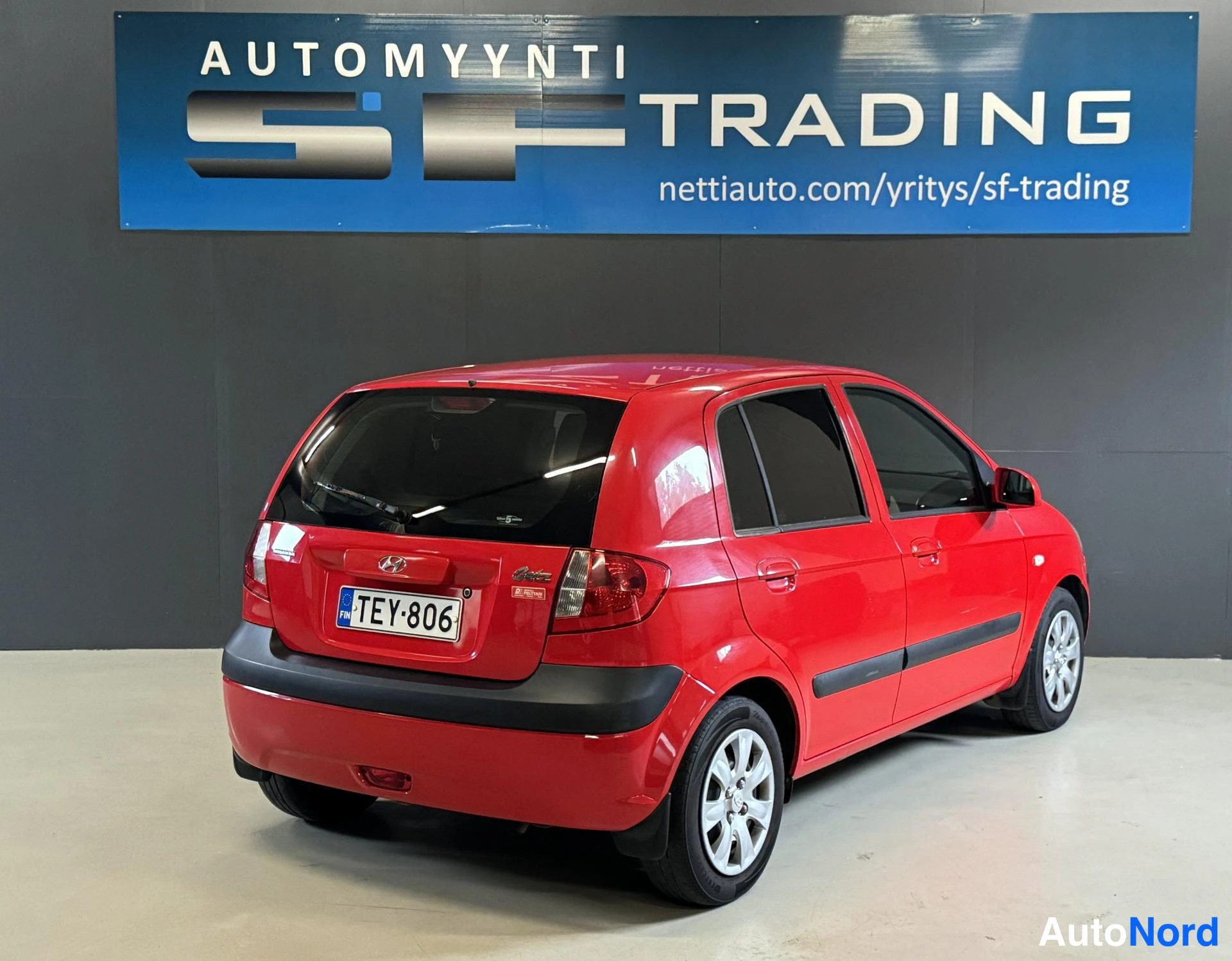 Punainen Hyundai Getz 2007, takaviisto, kuva 7