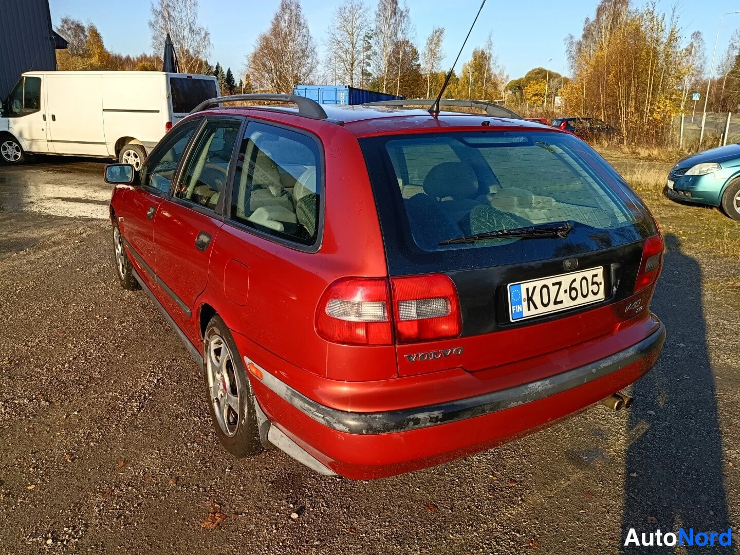 Oranssi Volvo V40 1998, takaviisto, kuva 6