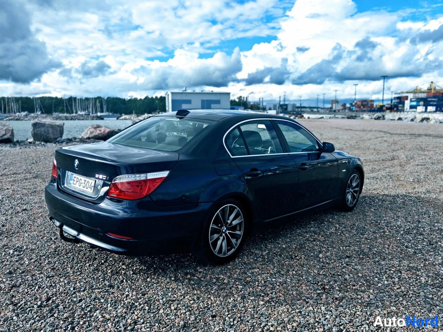 Blue BMW 520i 2008, rear three-quarter, photo 7