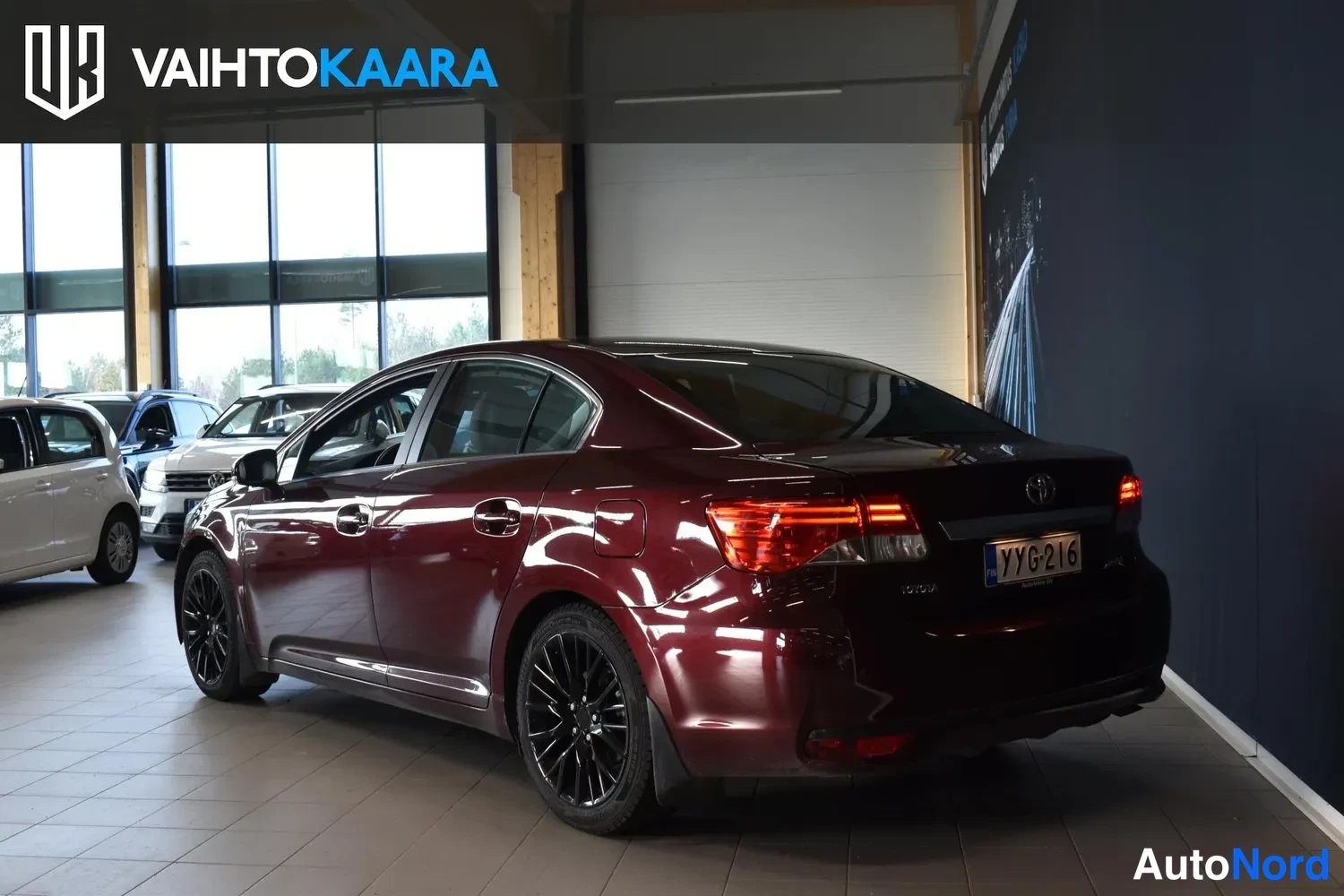 Red Toyota Avensis 2014, rear three-quarter, photo 3